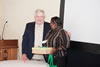 Photo of job coach Katrice Casey winning an iPad at the 13th Employment Supports Symposium